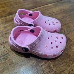 Crocs Pink Sparkle Toddler Size 8. Have been used some, but in great condition.